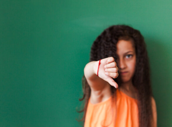pupil-showing-thumb-down.jpg